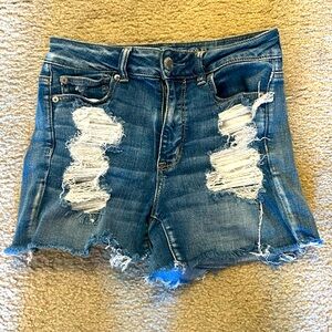 Medium wash ripped jean shorts